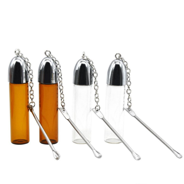 Large glass snuff vial with attached chain and spoon